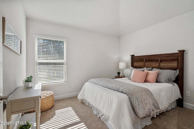 bedroom with light carpet