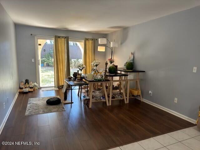 1707 El Prado Rd Unit 2, Jacksonville, FL 32216 - dining room featuring wood finished floors