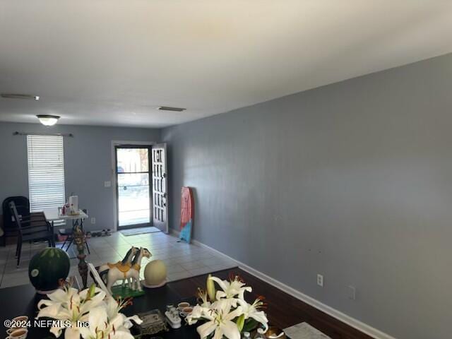 1707 El Prado Rd Unit 2, Jacksonville, FL 32216 - living room featuring baseboards and a desk