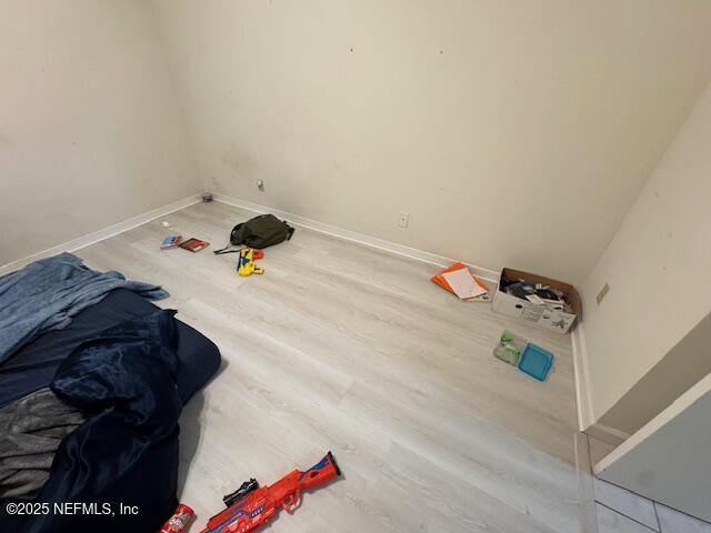 1707 El Prado Rd Unit 2, Jacksonville, FL 32216 - detailed view of wood finished floors and baseboards