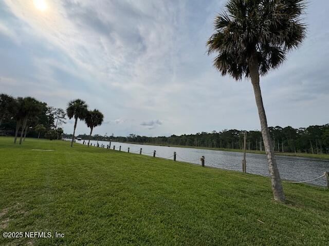 1707 El Prado Rd Unit 2, Jacksonville, FL 32216 - view of green lawn with a water view