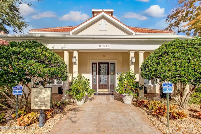 property entrance with a porch