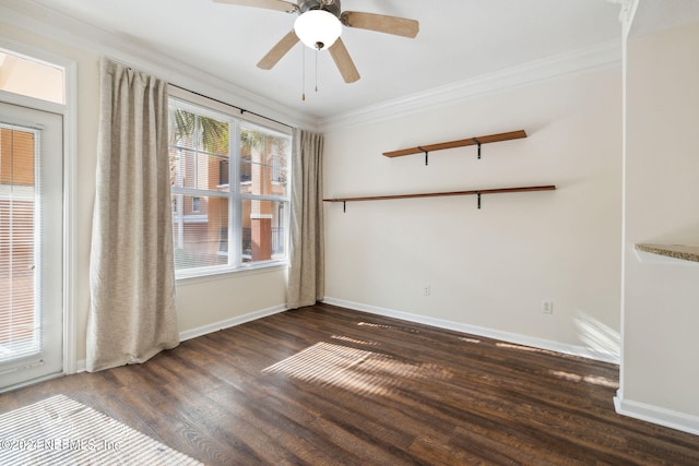 unfurnished room with crown molding, ceiling fan, and dark wood-type flooring