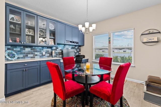 dining area with a notable chandelier