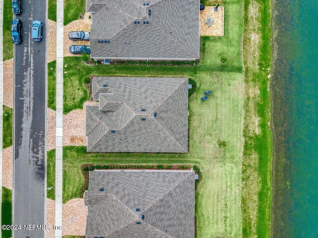 bird's eye view with a water view