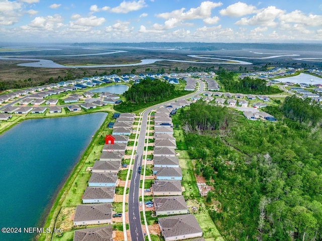 bird's eye view with a water view