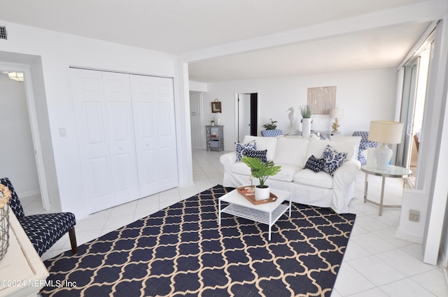 living room with light tile patterned floors