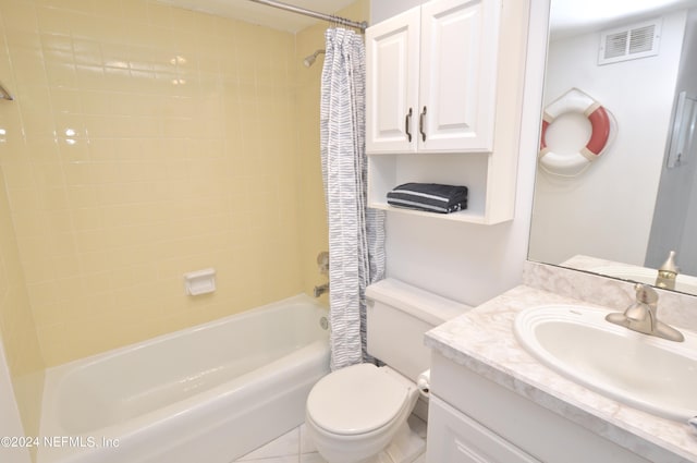 full bathroom with tile patterned floors, vanity, shower / bath combo, and toilet