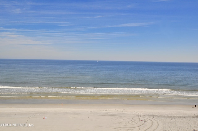 property view of water featuring a beach view