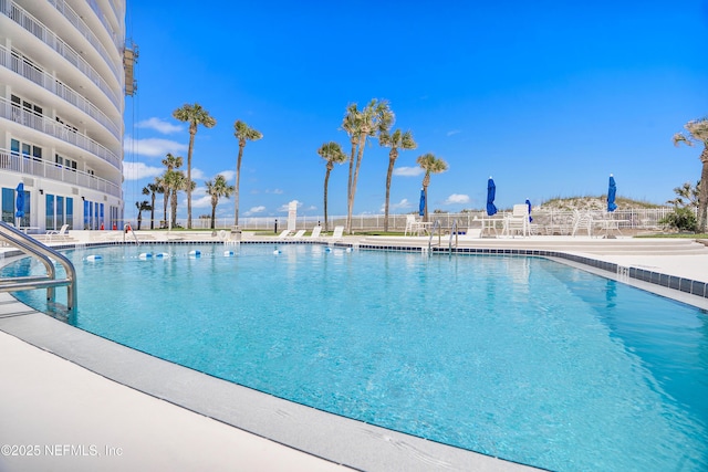 view of swimming pool featuring a patio