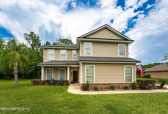 view of front of home featuring a front lawn