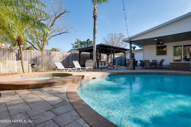 view of swimming pool with a pergola, an in ground hot tub, a patio, and ceiling fan