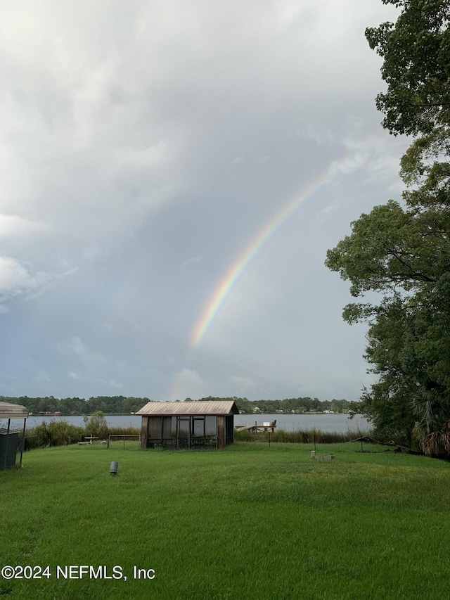 view of yard with a water view