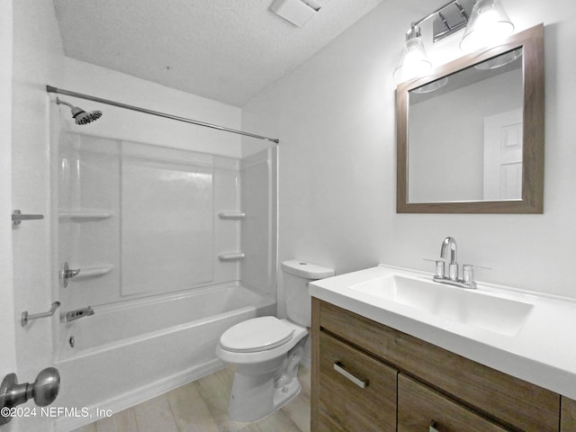 full bathroom with shower / bathtub combination, vanity, a textured ceiling, wood-type flooring, and toilet