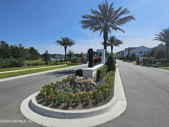 view of street featuring sidewalks and curbs