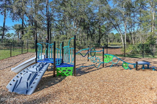 community jungle gym with fence