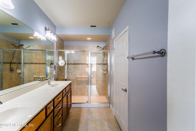 11789 Surfbird Cir Unit 6F, Jacksonville, FL 32256 - full bathroom featuring tile patterned flooring, a stall shower, and a sink