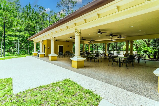 11789 Surfbird Cir Unit 6F, Jacksonville, FL 32256 - view of patio / terrace featuring outdoor dining space and a ceiling fan