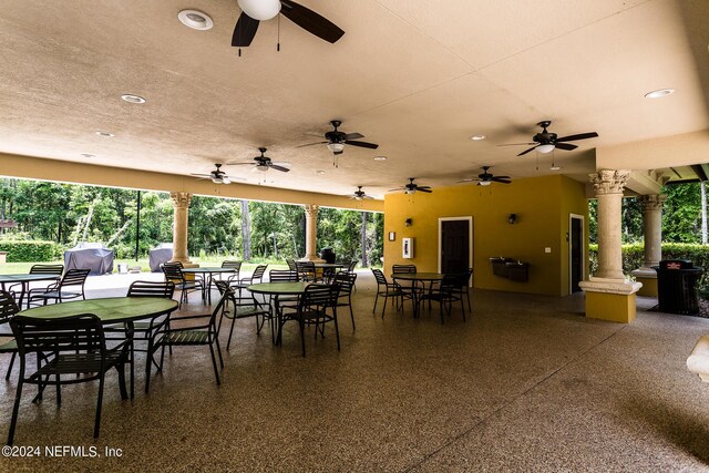 view of patio / terrace with area for grilling and ceiling fan