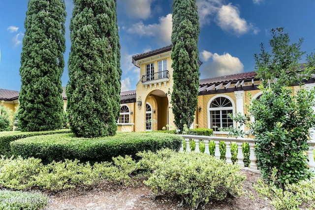 11789 Surfbird Cir Unit 6F, Jacksonville, FL 32256 - mediterranean / spanish-style home featuring a tile roof and stucco siding
