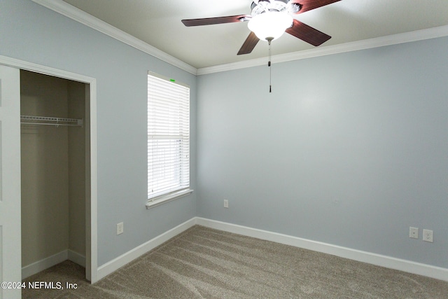 11789 Surfbird Cir Unit 6F, Jacksonville, FL 32256 - unfurnished bedroom with baseboards, ornamental molding, carpet flooring, a closet, and a ceiling fan