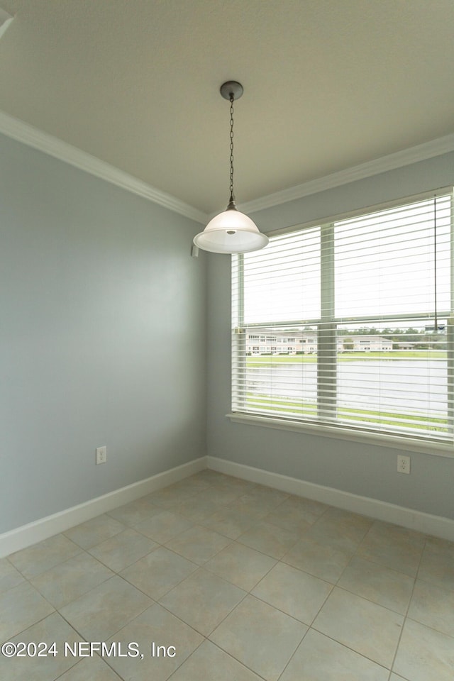 11789 Surfbird Cir Unit 6F, Jacksonville, FL 32256 - unfurnished room featuring light tile patterned flooring, baseboards, and ornamental molding
