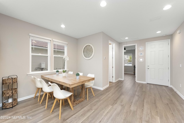 dining area with light wood-type flooring