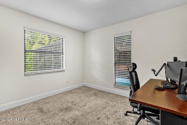 view of carpeted office space