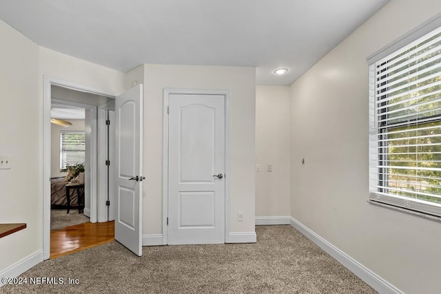 unfurnished bedroom with carpet