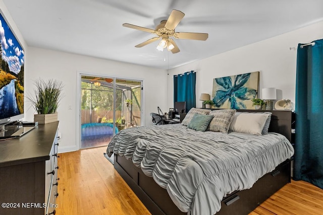 bedroom featuring access to exterior, ceiling fan, and light hardwood / wood-style flooring