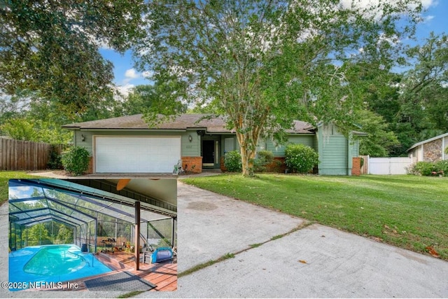 view of front of property featuring a garage, a lanai, and a front yard