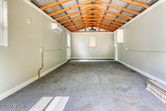 garage featuring a wall mounted AC