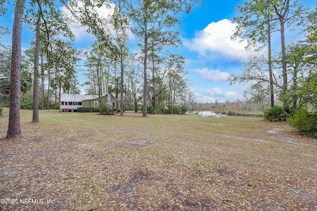 view of yard with a water view