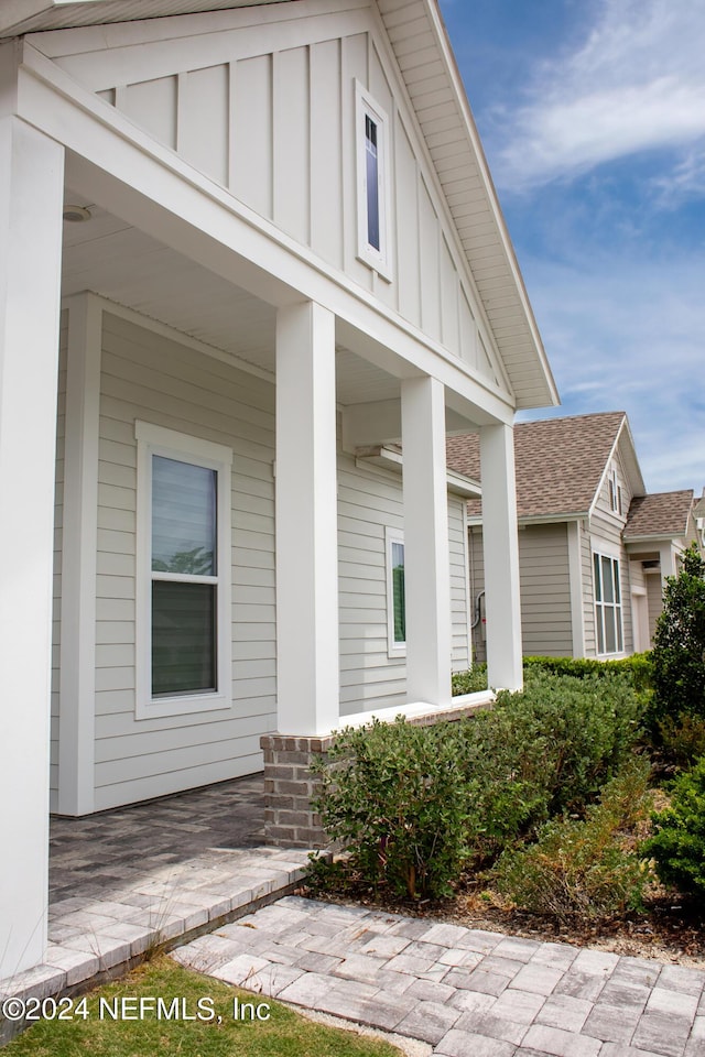 entrance to property with covered porch