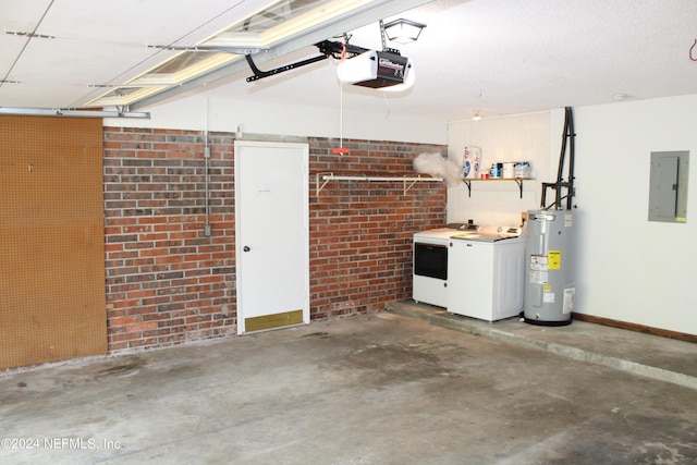 garage with a garage door opener, washing machine and dryer, electric water heater, electric panel, and baseboards