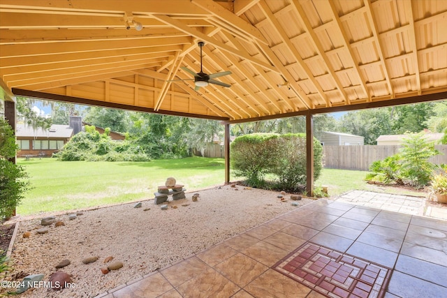 view of patio / terrace featuring fence, a ceiling fan, and a gazebo