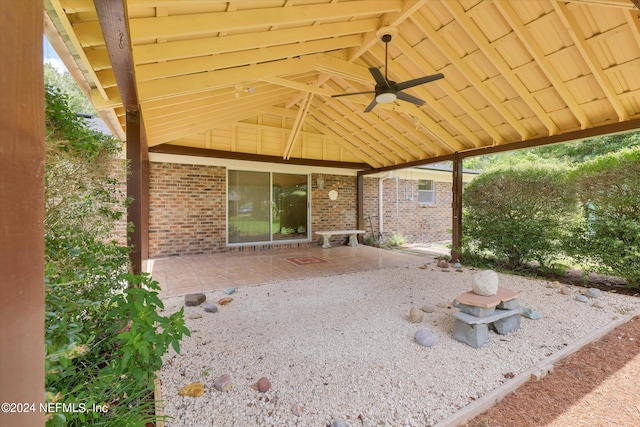 view of patio featuring a ceiling fan and a gazebo