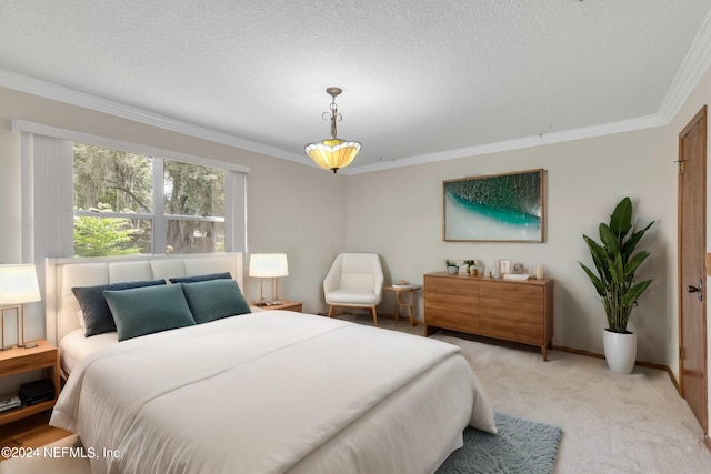 bedroom featuring light carpet, baseboards, ornamental molding, and a textured ceiling