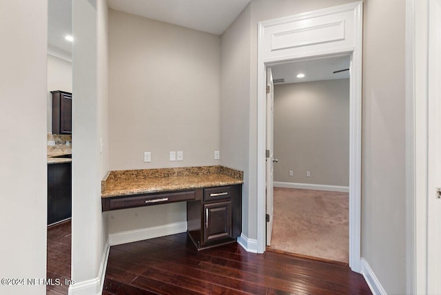 bathroom with wood-type flooring and tasteful backsplash