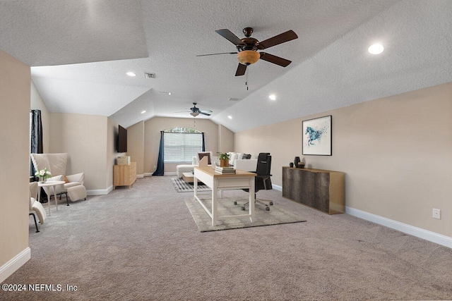 home office with a textured ceiling, light colored carpet, ceiling fan, and lofted ceiling