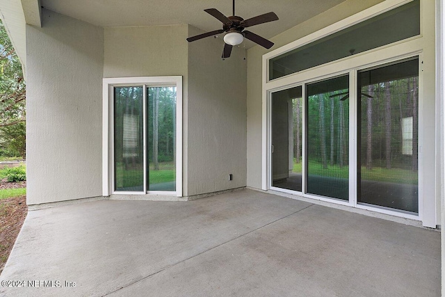 view of patio / terrace featuring ceiling fan