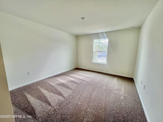 empty room featuring carpet