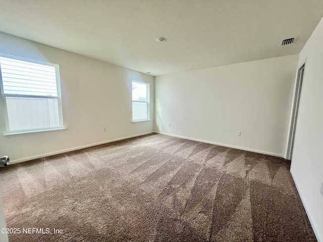 view of carpeted spare room