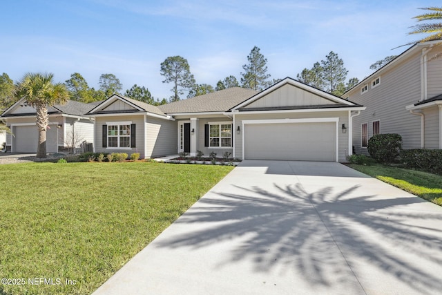 ranch-style house featuring a front yard and a garage