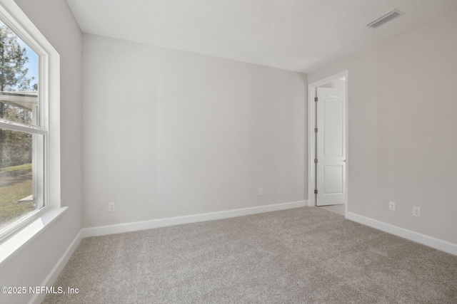 view of carpeted spare room