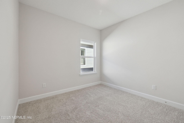 unfurnished room with carpet floors