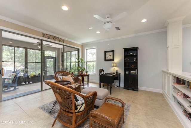 living area featuring crown molding and ceiling fan