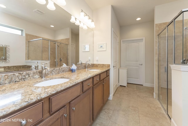 bathroom featuring vanity and walk in shower