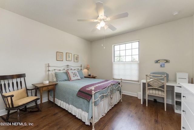 bedroom with ceiling fan and dark hardwood / wood-style flooring