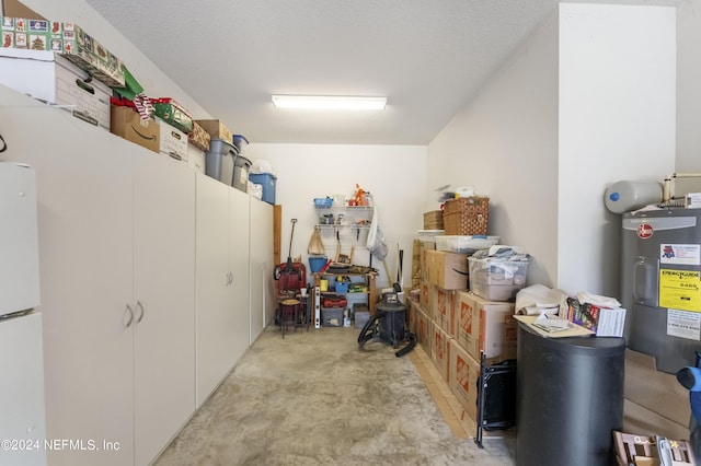 storage room with electric water heater